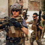 armed-men-with-rifles-in-abandoned-building-2026-09-24-11-46-43-utc (1)